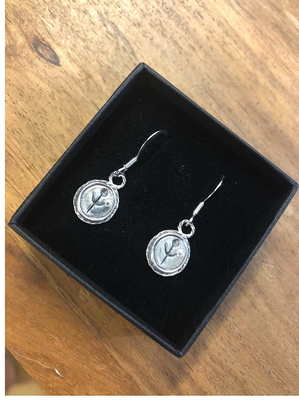 Silver Empanda Symbol Earrings Earrings YBDFinds